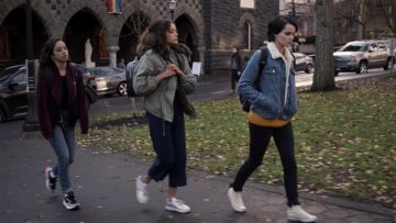 The Adidas jacket velvet black and burgundy Moe Truax (Kiana Madeira) in Trinkets (S01E09)