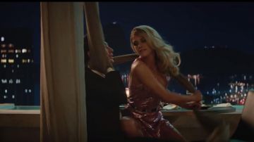 Mini bright sequined pink dress worn by Sabina Wilson (Kristen Stewart) in Charlie's Angels