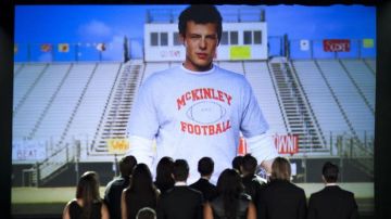 The gray t-shirt McKinley Football Finn Hudson (Cory Monteith) on Glee (S05E03)