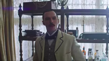 Black bow tie worn by Nikola Tesla (Nicholas Hoult) in The Current War