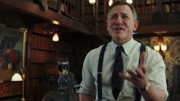 Black suspenders straps worn by Benoit Blanc (Daniel Craig) in Knives Out