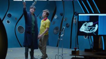 The robe of blue worn by Stillman (Asa Butterfield) in Time After Time