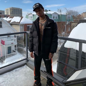 The down jacket black Palm Angels reach by Night Lovell on his account Instagram @nightlovell