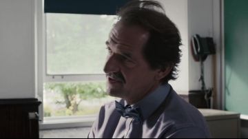 Grey long sleeve shirt worn by Zweig (Stéphane De Groodt) in Poor Georges