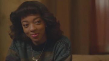 Green pullover worn by Shurrie (Zolee Griggs) as seen in Wu-Tang: An American Saga trailer