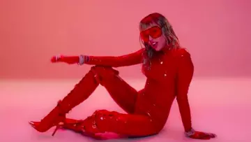 Red Jumpsuit in latex worn by Miley Cyrus in her Mother's Daughter music video