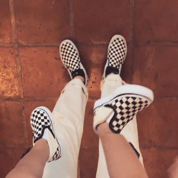 Checkered black and white vans worn by Troian Bellisario on her Instagram account @sleepinthegardn