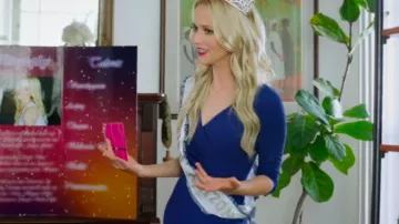 Long blue dress with v neck worn by Rose (Johanna Braddy) in Miss Arizona