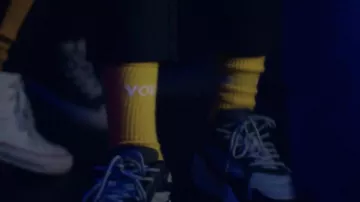 The socks are yellow in the Youtube video Y O K O Squeezie
