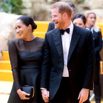 Gucci Broadway Embellished Satin Clutch worn by Meghan, Duchess of Sussex The Lion King European Premiere July 14, 2019