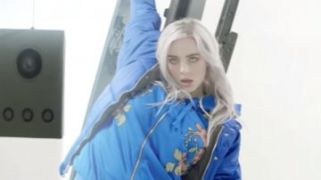 Blue oversized puffer jacket worn by Billie Eilish as seen in her Ilomilo music video