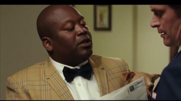khaki plaid blazer of The Amazing Fabular (Tituss Burgess) in We Hate Kids