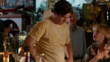 yellow bleached twirl design t-shirt worn by Cooper (Jake Lacy) in Ode to Joy