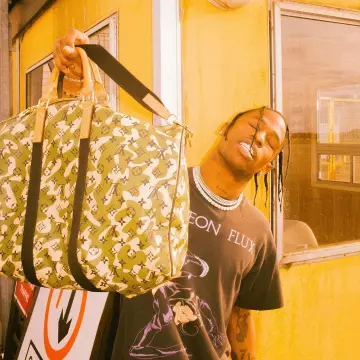 Travis Scott & Usher style up for the Louis Vuitton X Supreme