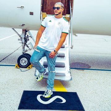 The Adidas sneakers at retail fluo worn by DJ Snake on his account Instagram @Djsnake