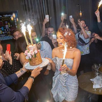 The strapless ruched sequined silver scope by Maeve Coucke on his birthday at the Pullman Paris Tour Eiffel on 28 June 2019
