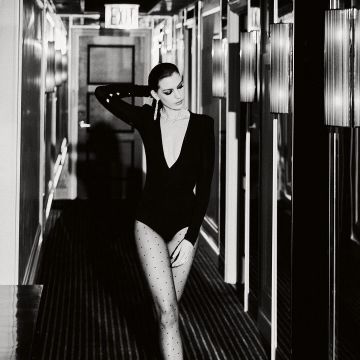 Black V-Neck Bodysuit of Anne Hathaway on the Instagram account @annehathaway