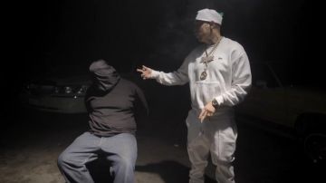 Lacoste white Jogging  worn by King Lil G in his No Face No Ca$e music video