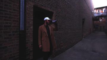 The coat Hugo Boss worn by Post Malone in her video clip Too Young