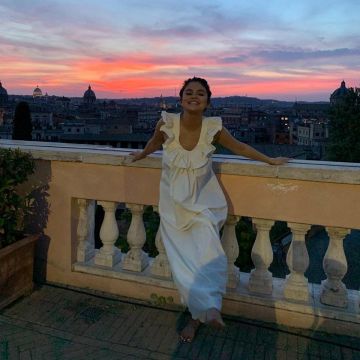 Three Graces Geraldine Ruffle Neck Maxi Dress worn by Selena Gomez Capri July 23, 2019