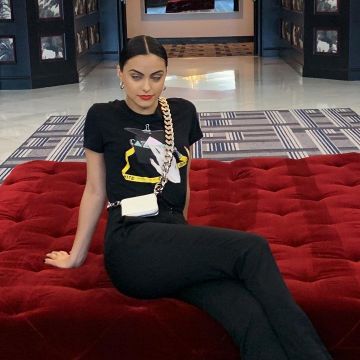 Off White Katie Inside Handbag Graphic T Shirt worn by Camila Mendes Instagram July 20, 2019