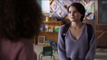 The sweater purple V-neck worn by Elodie Davis (Brianna Hildebrand) in Trinkets (S01E10)