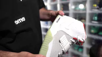 The pair of Nike Air Yeezy 2 Pure Platinum QrewTv in the video OMG THIS $500K SNEAKER COLLECTION IS INSANE!! *MUST SEE*