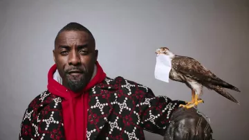 The coat Gucci worn by Idris Elba in the clip-Boasty Wiley, Sean Paul, Stefflon Gift