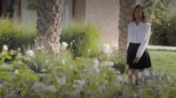 The black skirt short skater worn by Karine The trader in An ambition to intimate in the issue of August 12, 2019 with Michele Laroque