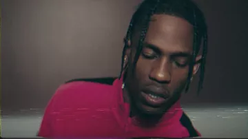 Pink red sweater worn by Travis Scott as seen in his Antisocial music video feat. Ed Sheeran