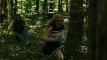 The outfit of a Cheerleader Camille Preaker (Sophia Lillis) in Sharp Objects (S01E03)
