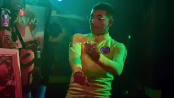 The Nike tracksuit jacket neon green of Manchester City carried by RK in his clip La Patate feat. Koba LaD