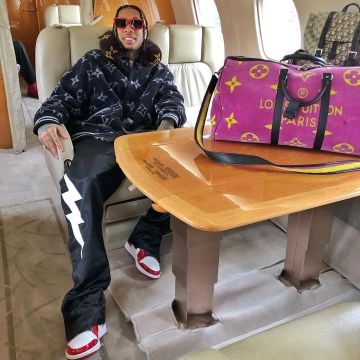 Zapatillas Nike Jordan 1 Retro Chicago (1994) usadas por Tyga en su cuenta de Instagram @tyga