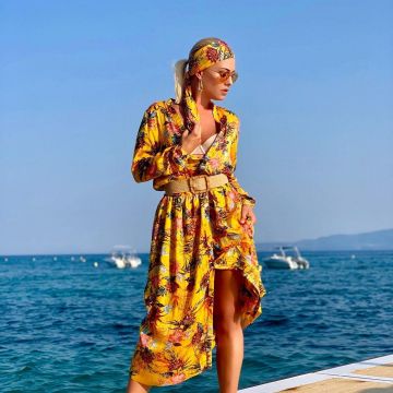 The yellow dress printed of Katrina Patchett on the account instagram of @patchettkatrina
