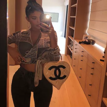 Chanel Patent Leather Heart Handbag worn by Kylie Jenner Instagram Stories August 3, 2019