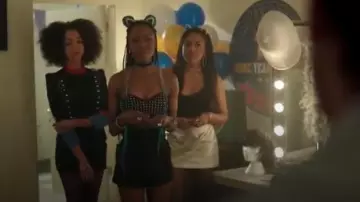Alice + Olivia Gold Mayra Metallic Mini Skirt worn by Melody Valentine (Asha Bromfield) in Riverdale (Season 01 Episode 13)