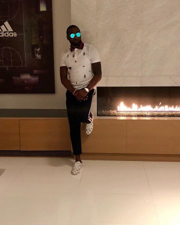The polo Gucci John Wall on his account Instagram @johnwall