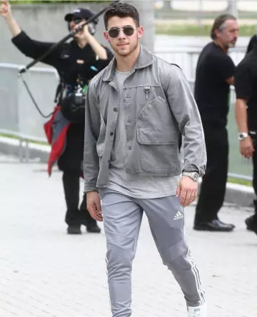 Adidas Tiro Soccer Training Pants in Grey worn by Arriving to the American Airlines Center in Miami August 7, 2019 worn by Nick Jonas @nickjonas