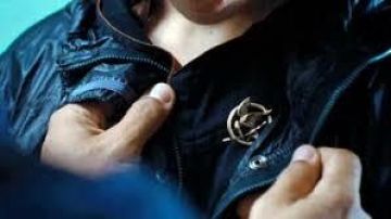 The pin Katniss Everdeen (Jennifer Lawrence) in Hunger Games