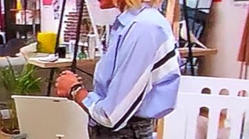 The shirt is sky-blue range by Caroline Keslassi in the program Better at home