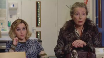 The purple dress with printed cheetah Kate (Emilia Clarke) in Last Christmas