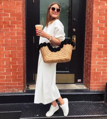 La panier avec pompons noirs porté par Olivia Palermo sur le compte Instagram de @oliviapalermo