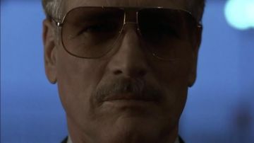 Lunettes de soleil Cartier Gold portées par Fast Eddie Felson (Paul Newman) dans la garde-robe du film The Color of Money