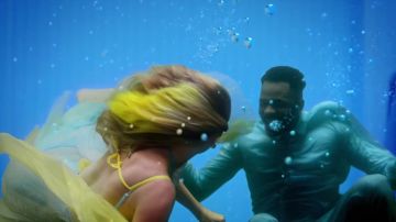 The dress pastel multi-color Taylor Swift in the music video for Taylor Swift - Lover