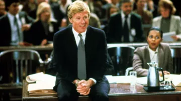 Traje de negocios negro usado por Tom Logan (Robert Redford) en Legal Eagles