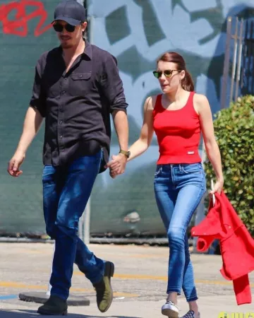 Vans Checkerboard Slip On Sneaker worn by Emma Roberts Hollywood August 27, 2019