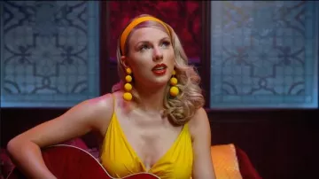Yellow Sleeveless Wrap Dress worn by Taylor Swift in Taylor Swift - Lover
