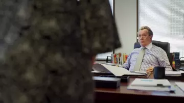 Light silver tie worn by Jürgen Mossack (Gary Oldman) in The Laundromat