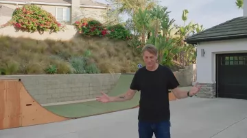 Black Tee worn by Tony Hawk in 73 Questions With Tony Hawk | Vogue