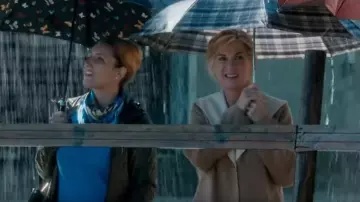 Brown coat worn by Michèle Laroque in MERRY RETIREMENT trailer (2019) Michèle Laroque, Thierry Lhermitte